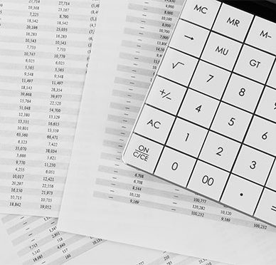 Calculator and Financial Documents on a Desk for Tax Accounting Services